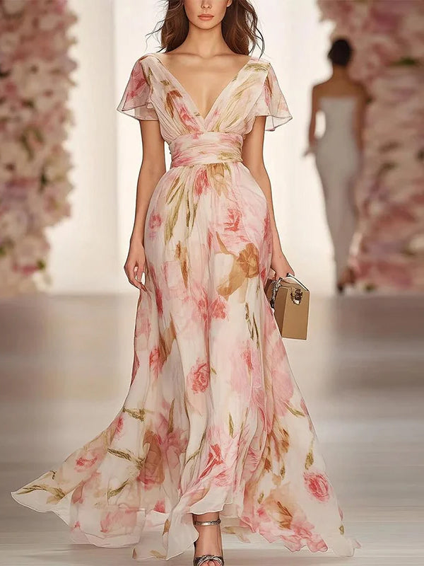 Abito Lungo Elegante con Maniche Svolazzanti e Stampa Floreale – Grazia Leggera per Ogni Occasione