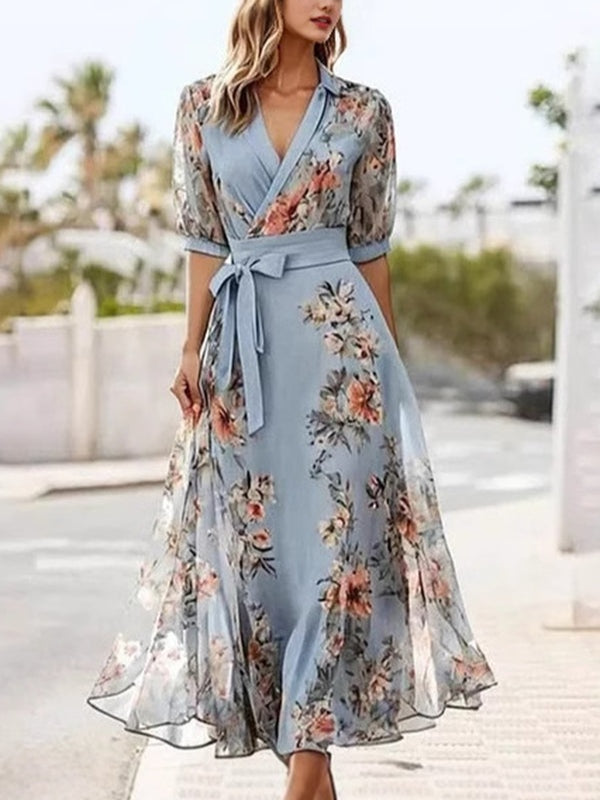 Abito Midi con Stampa Floreale, Scollo a V e Fiocco in Vita – Eleganza Romantica per le Tue Giornate di Sole