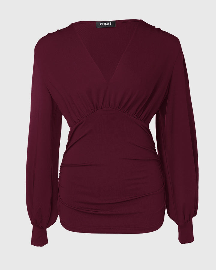 Blusa Elegante con Scollo Profondo, Maniche a Lanterna e Arricciature Laterali