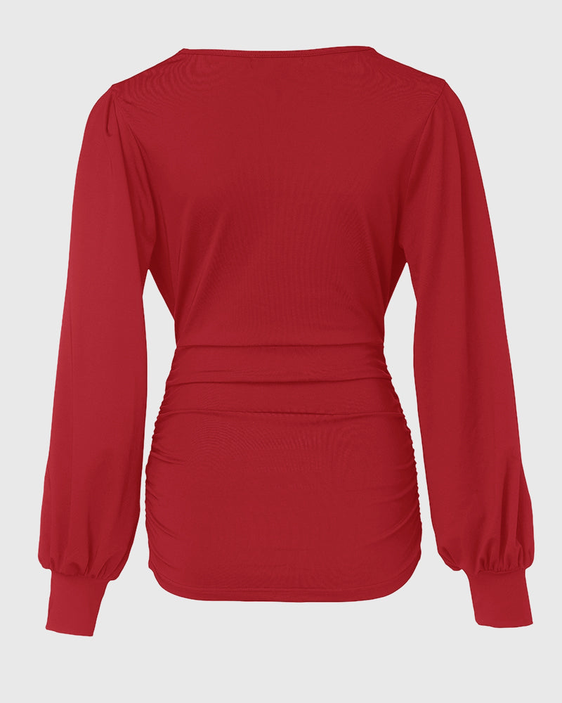 Blusa Elegante con Scollo Profondo, Maniche a Lanterna e Arricciature Laterali