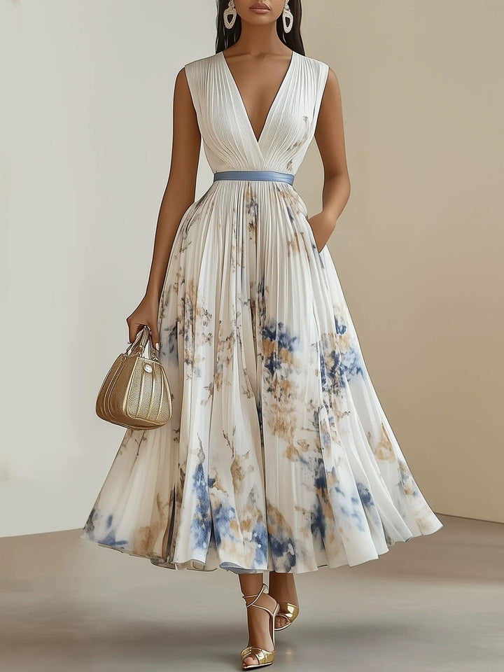 Abito midi plissettato con stampa floreale e scollo a V – Eleganza senza tempo