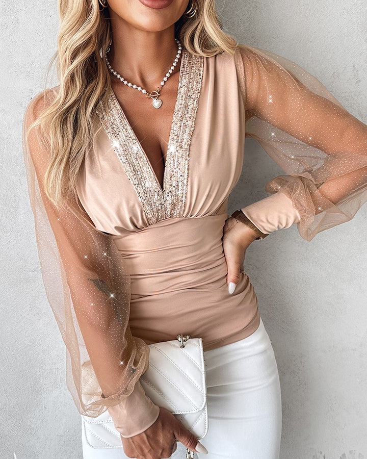 Blusa Elegante con Scollo Profondo, Maniche a Lanterna e Arricciature Laterali