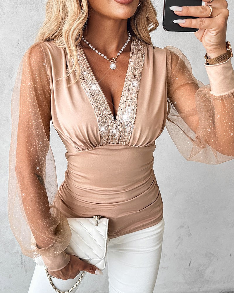 Blusa Elegante con Scollo Profondo, Maniche a Lanterna e Arricciature Laterali