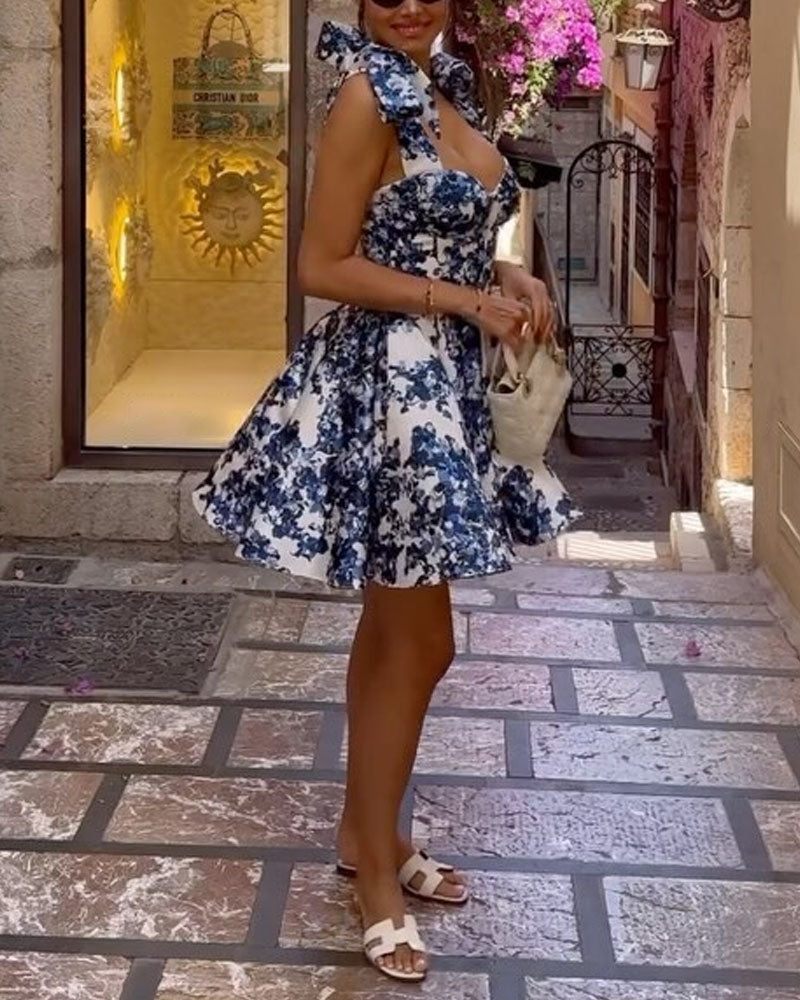 Abito Corto con Stampa Floreale e Fiocchi sulle Spalle – Eleganza Romantica