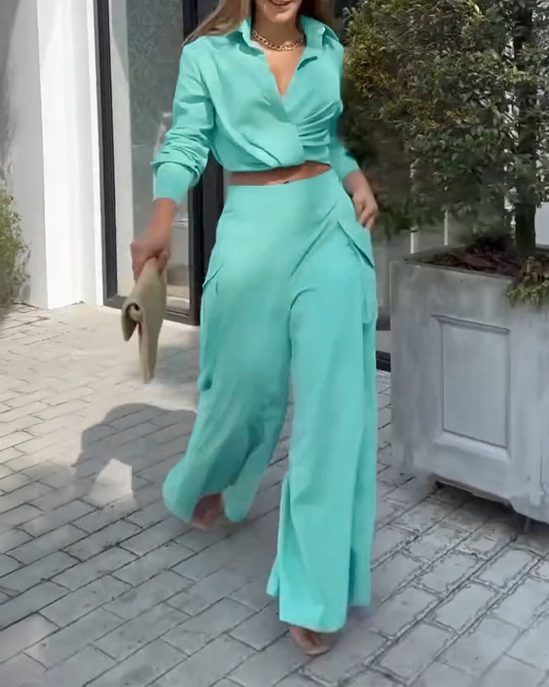 Completo Elegante con Camicia Drappeggiata e Pantaloni Asimmetrici a Gamba Larga