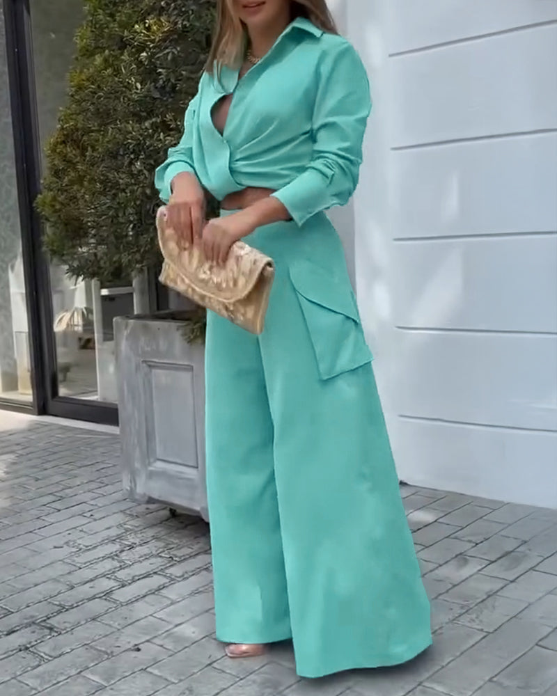 Completo Elegante con Camicia Drappeggiata e Pantaloni Asimmetrici a Gamba Larga