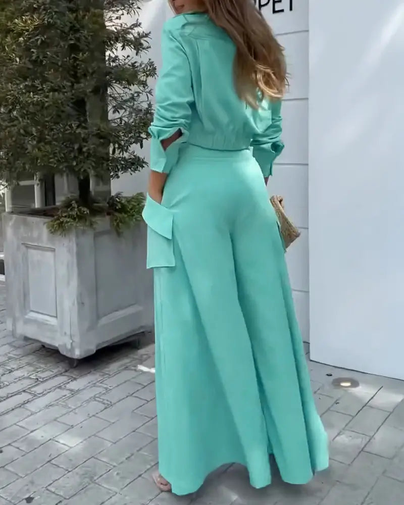 Completo Elegante con Camicia Drappeggiata e Pantaloni Asimmetrici a Gamba Larga