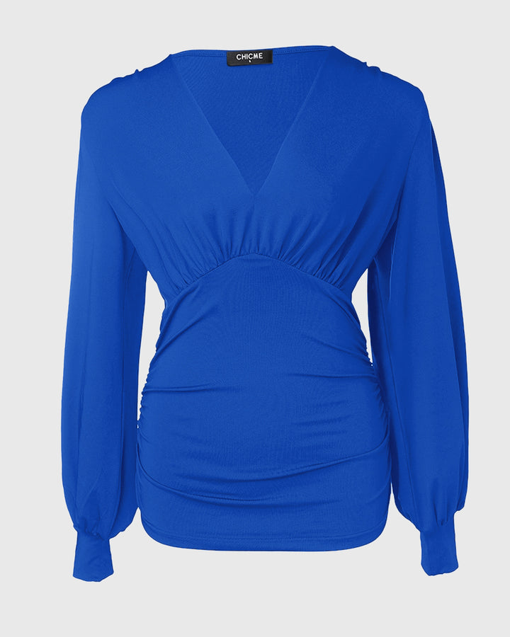 Blusa Elegante con Scollo Profondo, Maniche a Lanterna e Arricciature Laterali