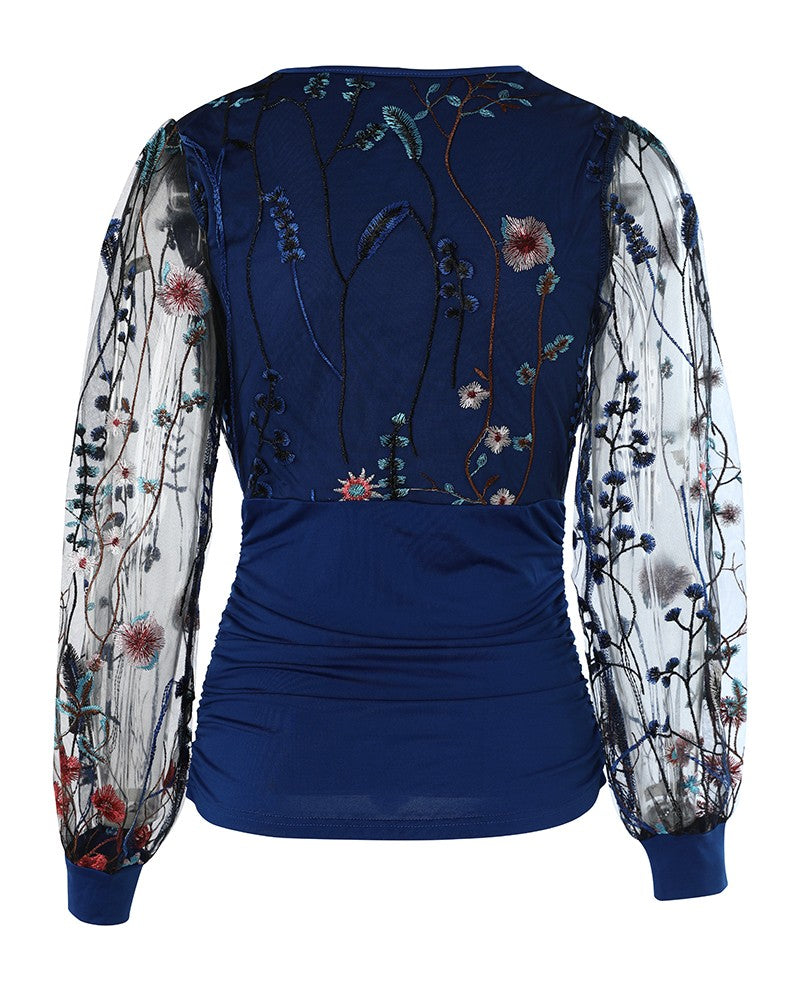 Blusa Elegante con Scollo Profondo, Maniche a Lanterna e Arricciature Laterali