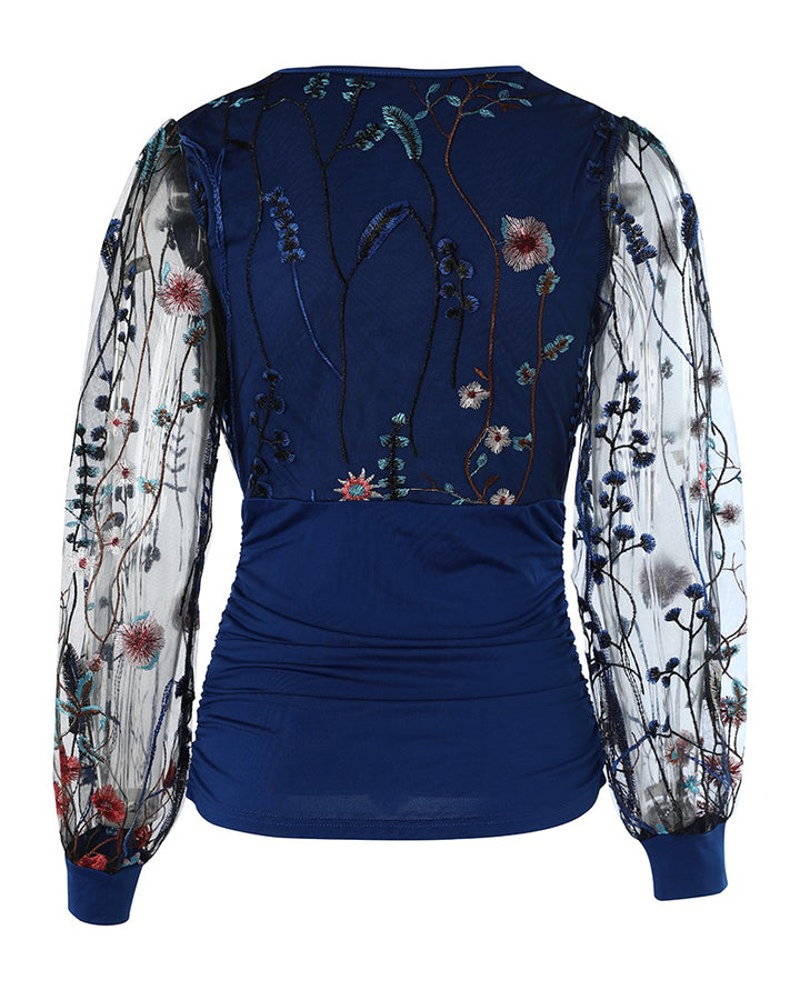 Blusa Elegante con Scollo Profondo, Maniche a Lanterna e Arricciature Laterali