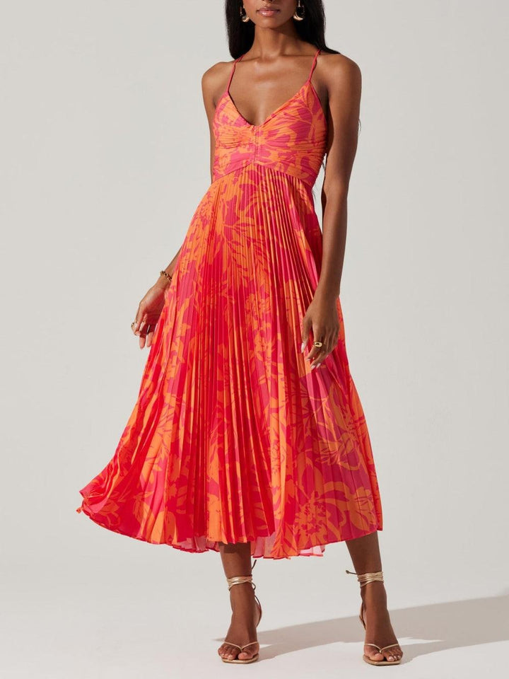 Abito Midi a Pieghe con Stampa Floreale – Eleganza Naturale e Femminilità in Movimento
