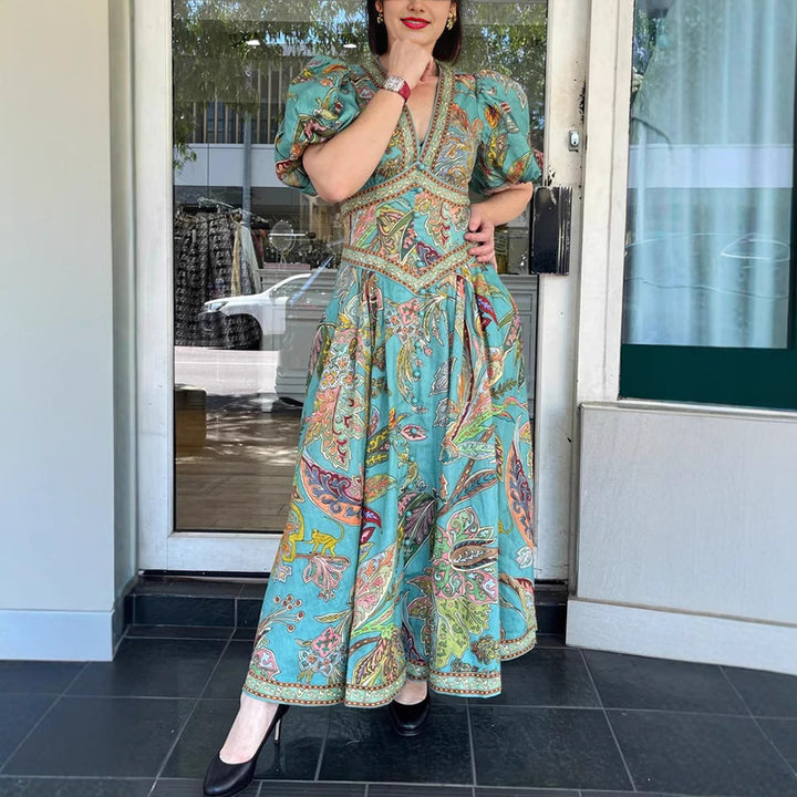 Abito Maxi con Maniche a Sbuffo e Tasche – Stampa Esclusiva per Vacanze Chic