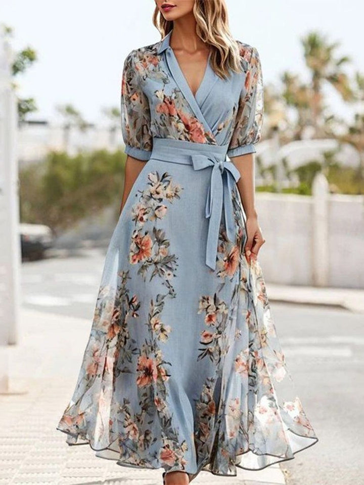 Abito Midi con Stampa Floreale, Scollo a V e Fiocco in Vita – Eleganza Romantica per le Tue Giornate di Sole