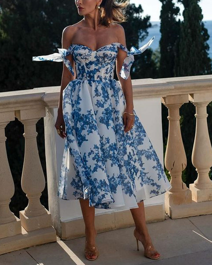 Abito Elegante con Stampa Floreale e Spalle Scoperte – Romantico e Raffinato
