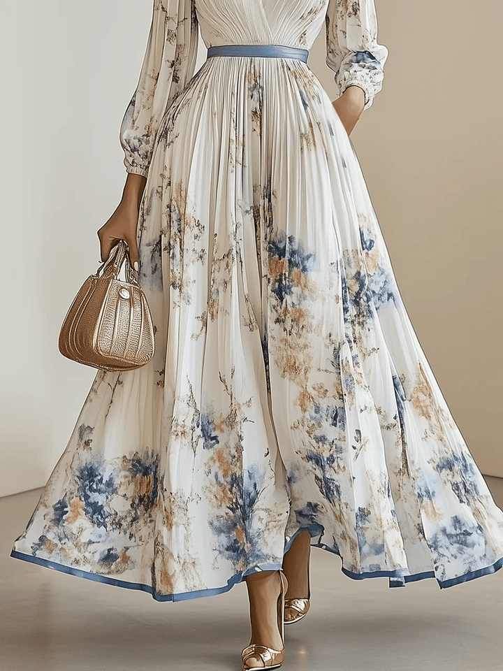 Abito lungo plissettato con stampa floreale e maniche a palloncino – Eleganza romantica per ogni occasione
