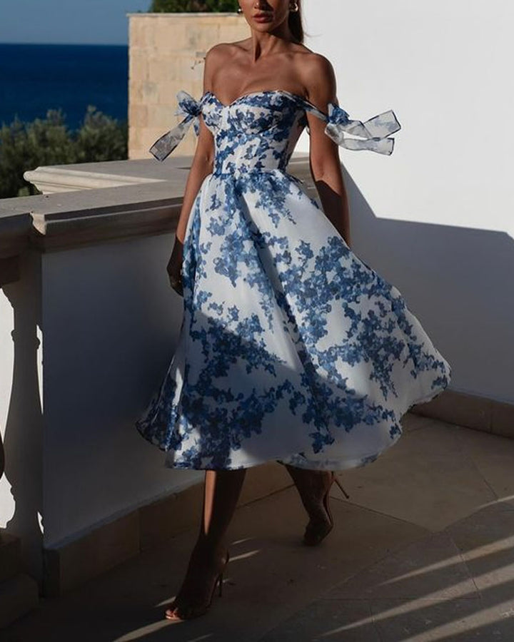 Abito Elegante con Stampa Floreale e Spalle Scoperte – Romantico e Raffinato