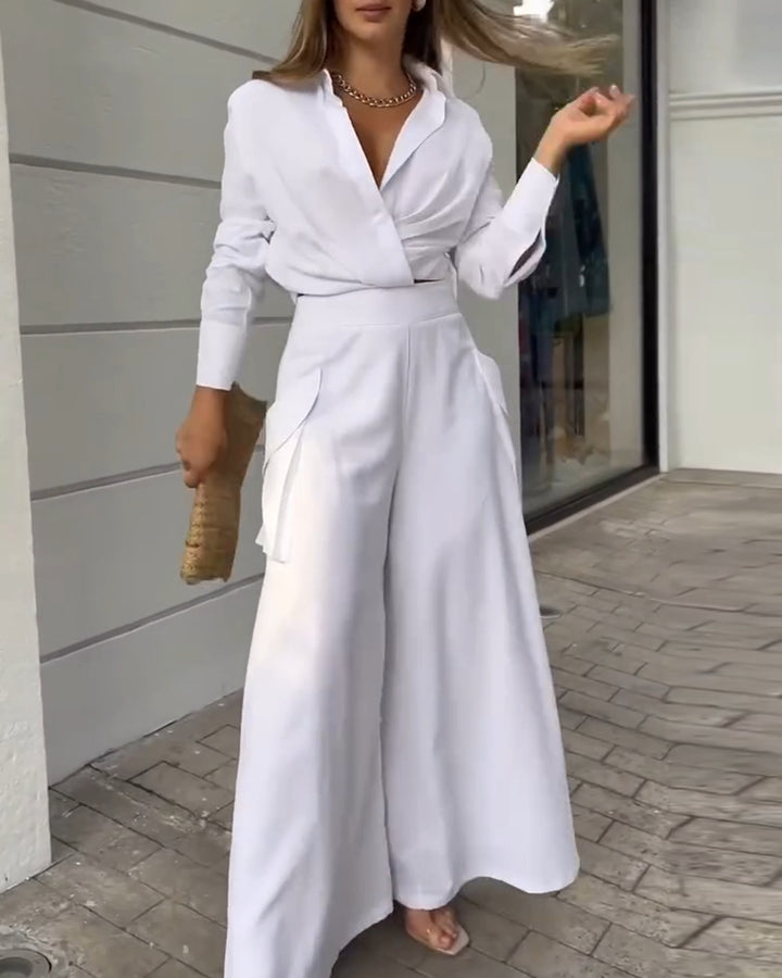 Completo Elegante con Camicia Drappeggiata e Pantaloni Asimmetrici a Gamba Larga