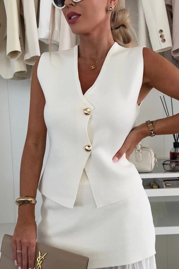 Completo Due Pezzi Elegante con Gilet Strutturato e Gonna Plissettata a Vita Alta – Stile e Raffinatezza